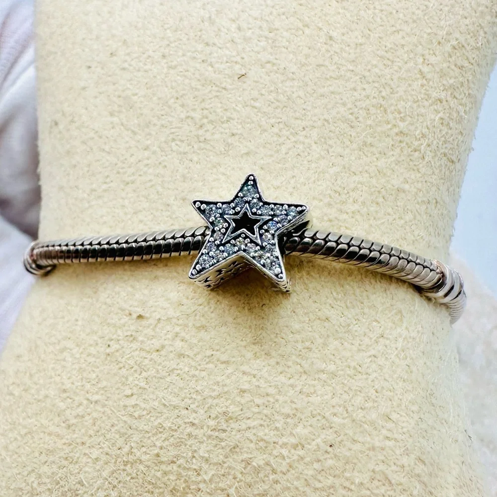EUC Pandora 790016C01 Sterling Silver Asymmetric Star Charm w/ Clear CZ’s